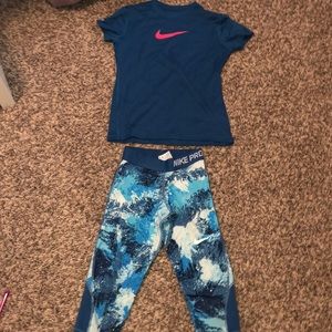 Blue Nike Shirt and Cropped Nike Pro Leggings